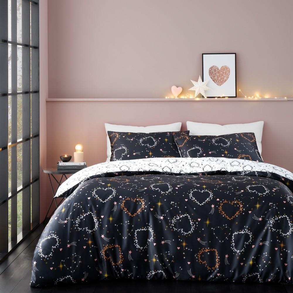 Catherine Lansfield Cosmic Hearts and Stars Reversible Single Duvet Cover Set with Pillowcase Black