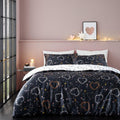 Catherine Lansfield Cosmic Hearts and Stars Reversible Double Duvet Cover Set with Pillowcases Black